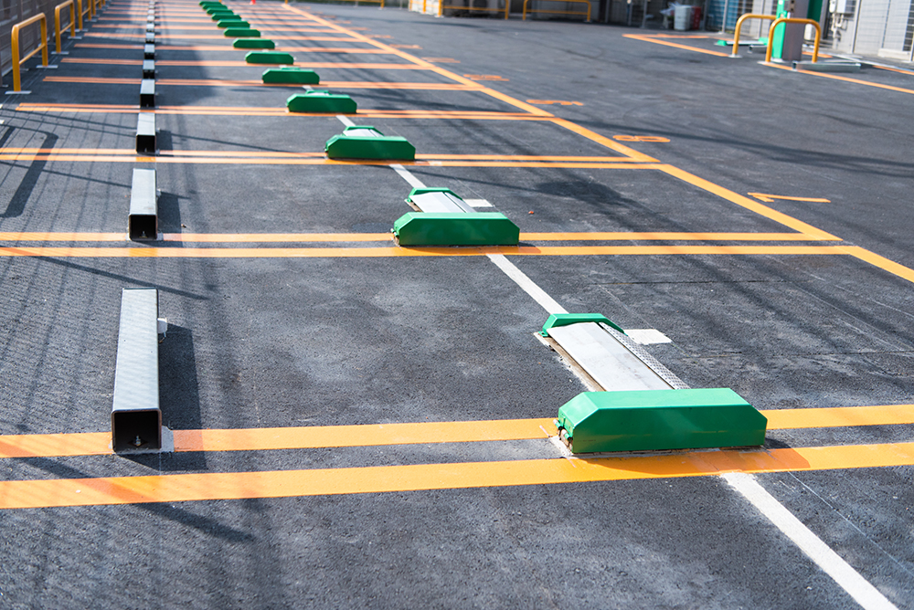 【インフラ整備】私道の権利関係等を整理し、<br>土地の価値を最大化した駐車場用地売却事例